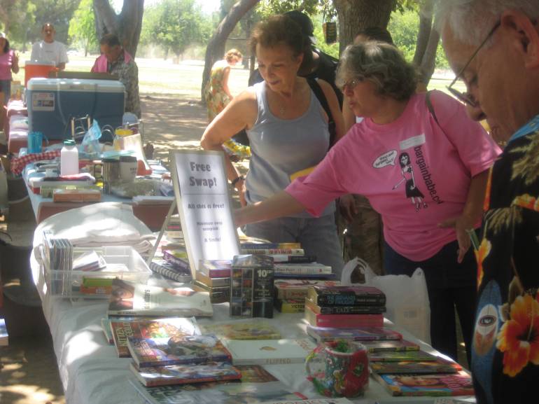 Volunteer Bobbi running a free swap - one of the most popular events at Frugal Fe$t!